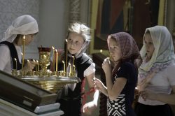 Sheet Music. Women and Girls lighting candles.